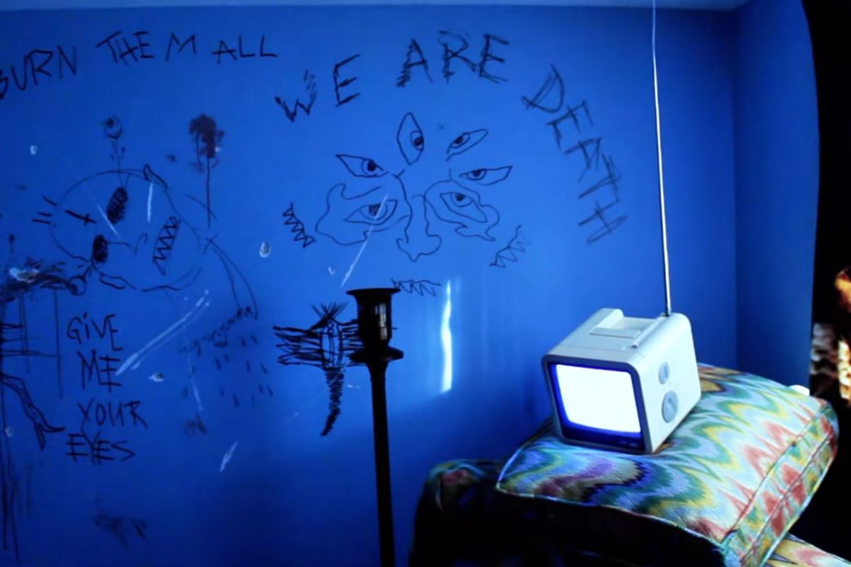 it's a movie still with we are death written on the wall, brothers and sisters, this is the bomb